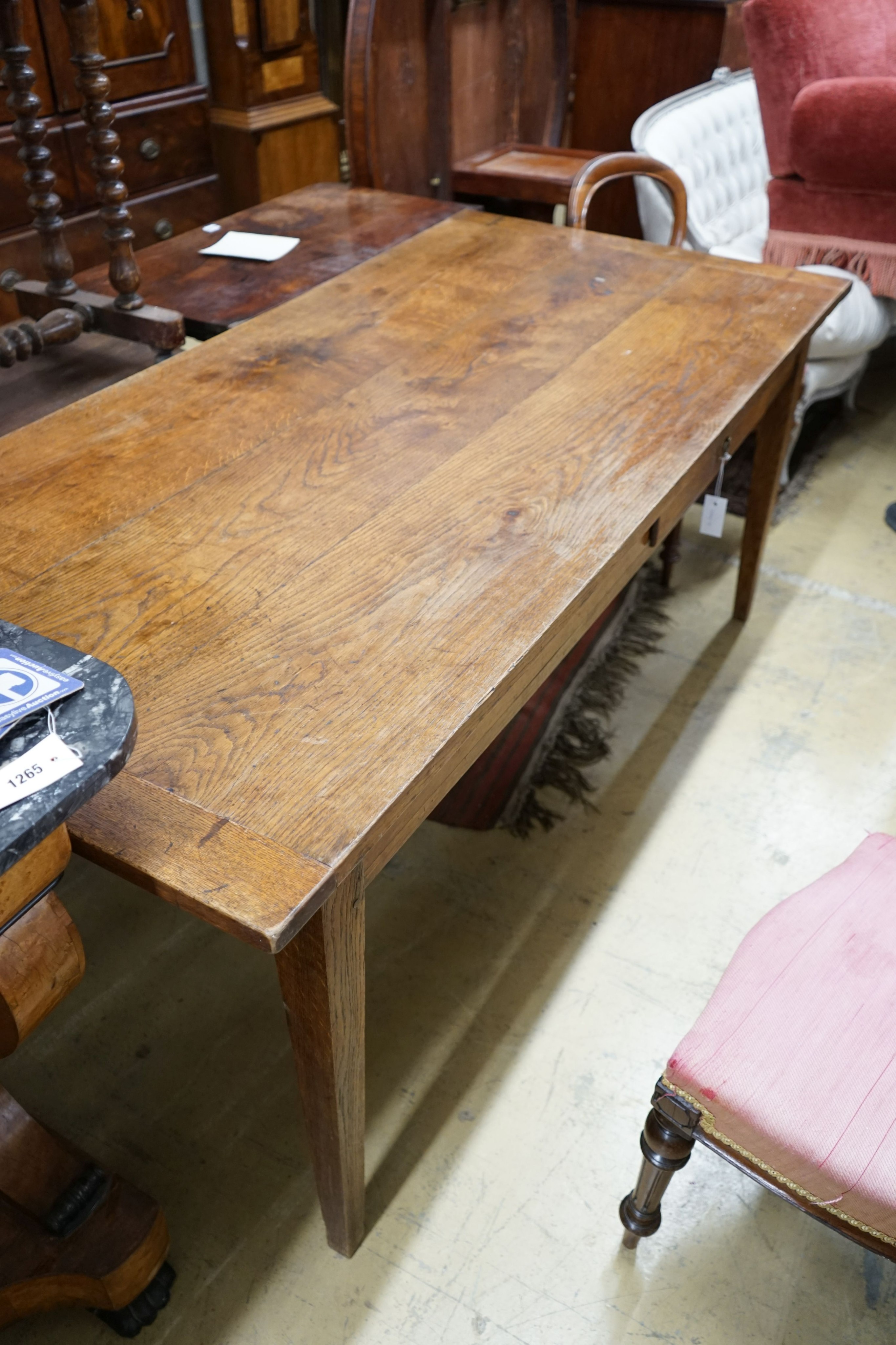 A 19th century French rectangular oak kitchen table, length 183cm, depth 87cm, height 75cm